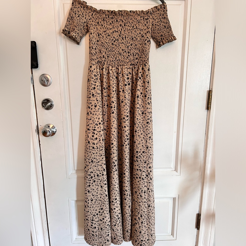 Off the shoulder beige dress with small black flower print and slit